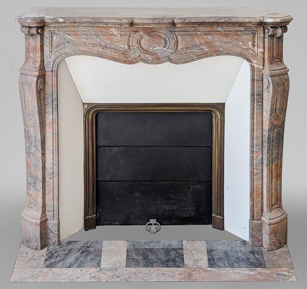 An antique Louis XV style fireplace, Pompadour model, made out of Enjugerais marble-0