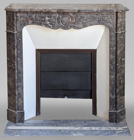 An antique Louis XV style fireplace, Pompadour model, made out of Enjugerais marble-0