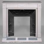 Louis XVI style fireplace in veined white marble decorated with a garland