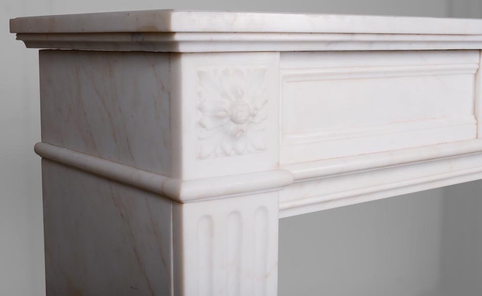 Louis XVI style fireplace in veined white marble decorated with a garland-3