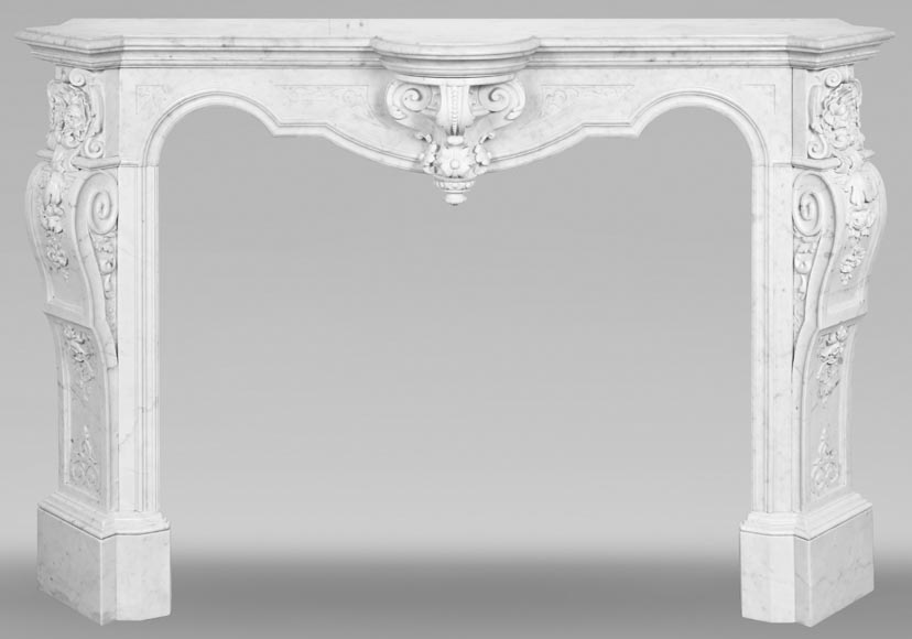 A richly sculpted Carrara marble fireplace in the Napoleon III style, decorated with a lion's head. A richly sculpted Carrara marble fireplace in the Napoleon III style, decorated with a lion's head.-0