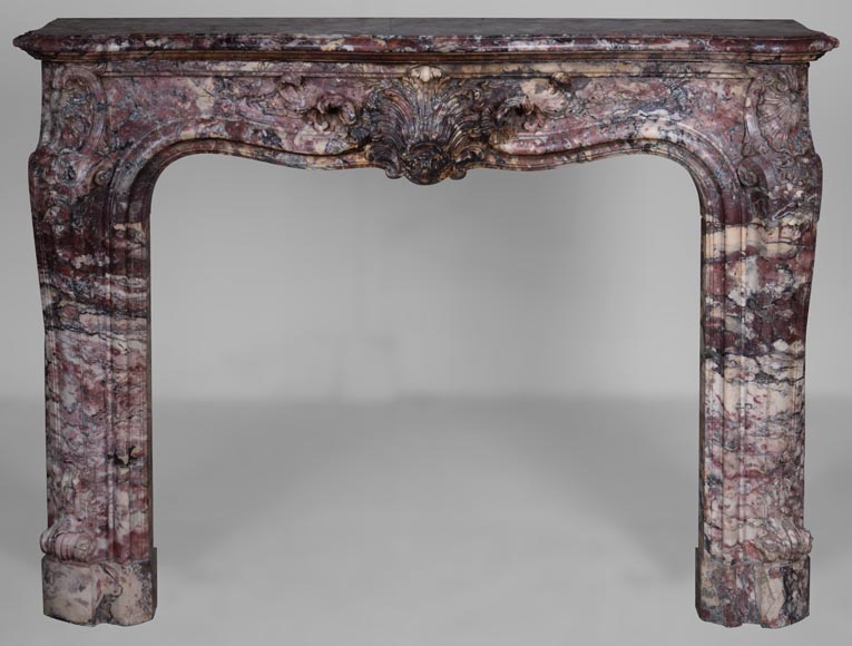 Important Louis XV style fireplace decorated with a leaf, made of Fleur de Pêcher marble-0