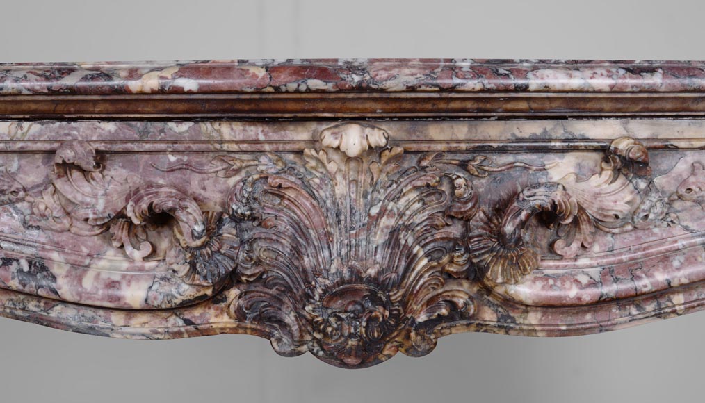 Important Louis XV style fireplace decorated with a leaf, made of Fleur de Pêcher marble-1