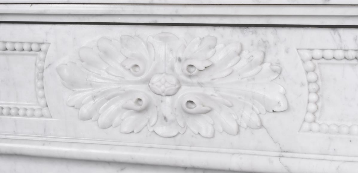Louis XVI style fireplace with acanthus leaves and beading, in Carrara marble-1