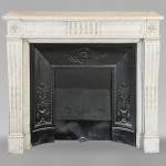 Louis XVI style fireplace in Carrara marble with rudentures