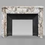 Louis XVI style fireplace with half-columns and rudenture in Arabescato marble