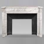 Louis XVI style fireplace with half-columns and rudenture in Carrara marble
