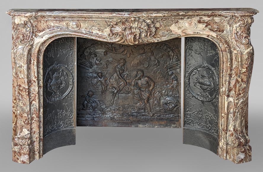 Exceptional Louis XV style fireplace in Rouge Royal marble with an asymmetrical shell-0