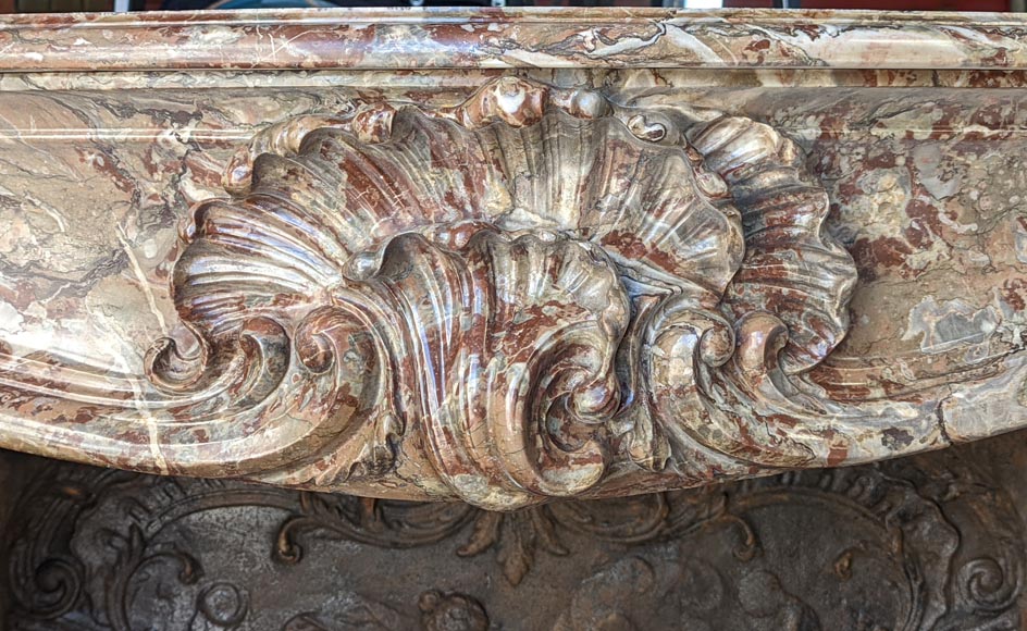 Exceptional Louis XV style fireplace in Rouge Royal marble with an asymmetrical shell-1