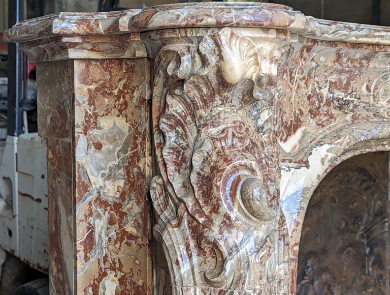 Exceptional Louis XV style fireplace in Rouge Royal marble with an asymmetrical shell-6