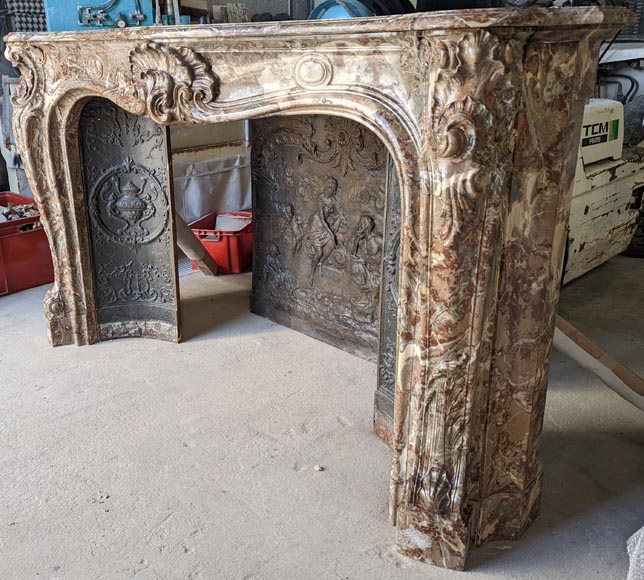 Exceptional Louis XV style fireplace in Rouge Royal marble with an asymmetrical shell-10