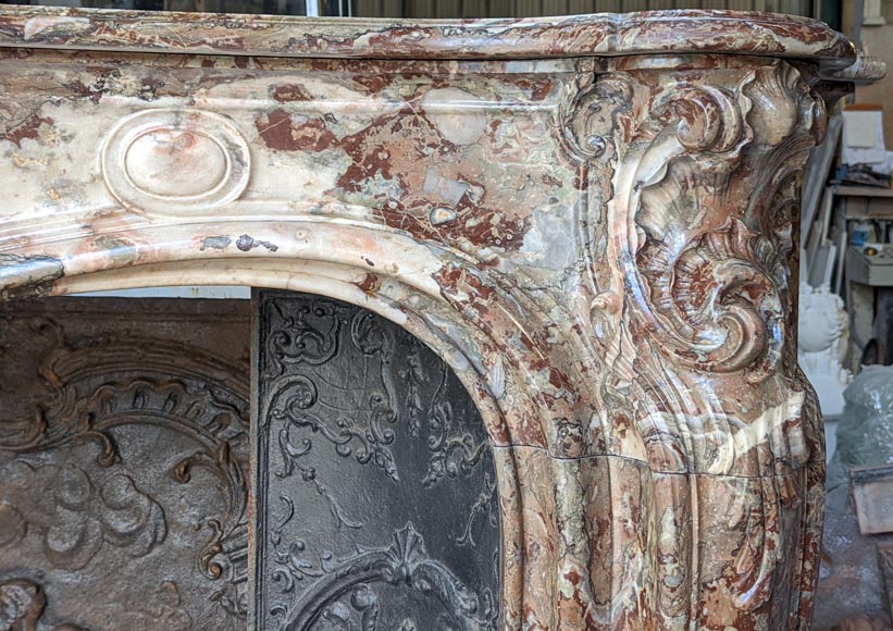 Exceptional Louis XV style fireplace in Rouge Royal marble with an asymmetrical shell-11