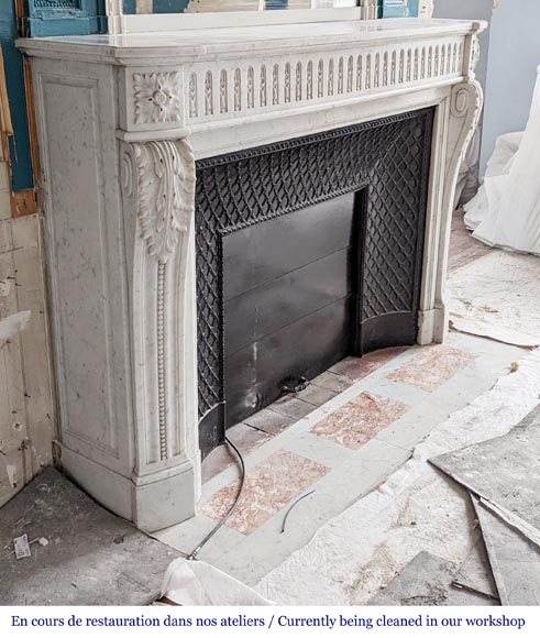 Large curved Louis XVI style fireplace with floral rudenture and acanthus leaf in Carrara marble-3
