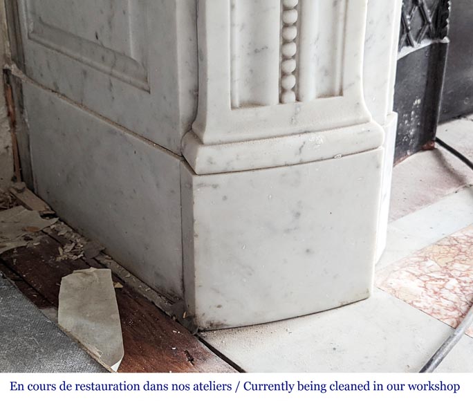Large curved Louis XVI style fireplace with floral rudenture and acanthus leaf in Carrara marble-6