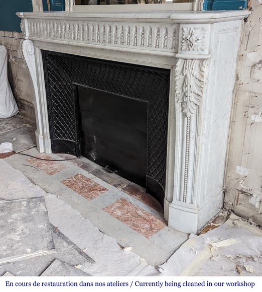 Large curved Louis XVI style fireplace with floral rudenture and acanthus leaf in Carrara marble-7