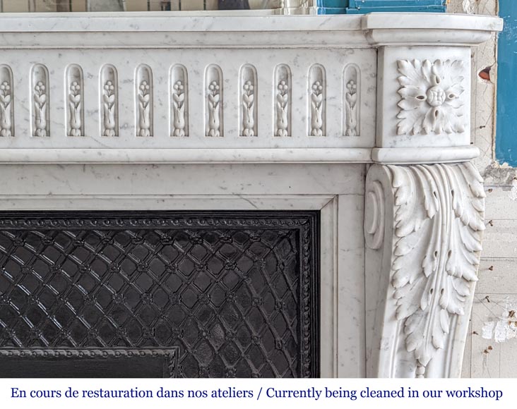 Large curved Louis XVI style fireplace with floral rudenture and acanthus leaf in Carrara marble-8