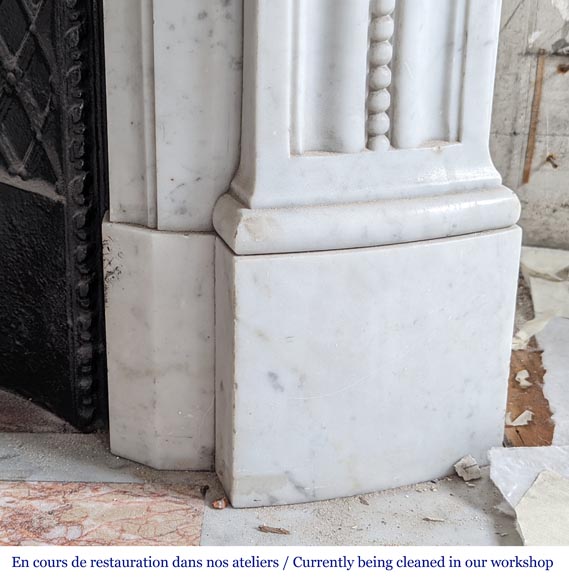 Large curved Louis XVI style fireplace with floral rudenture and acanthus leaf in Carrara marble-9