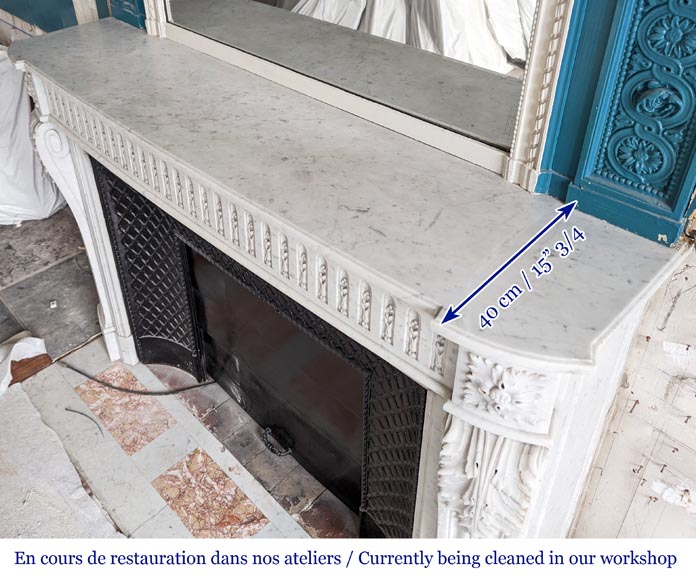 Large curved Louis XVI style fireplace with floral rudenture and acanthus leaf in Carrara marble-10