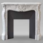 Louis XV style mantel with three shells in Carrara marble