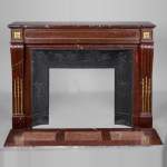 Louis XVI style fireplace in Griotte marble beaded with gilded bronze