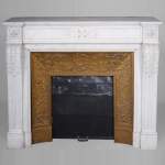 Louis XVI style fireplace with acanthus leaves carved in Carrara marble