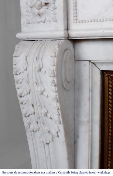 Louis XVI style fireplace with acanthus leaves carved in Carrara marble-5