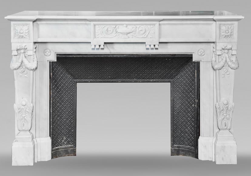 A Louis XVI style fireplace, richly decorated with garlands and vases, in Carrara marble A Louis XVI style fireplace, richly decorated with garlands and vases, in Carrara marble-0