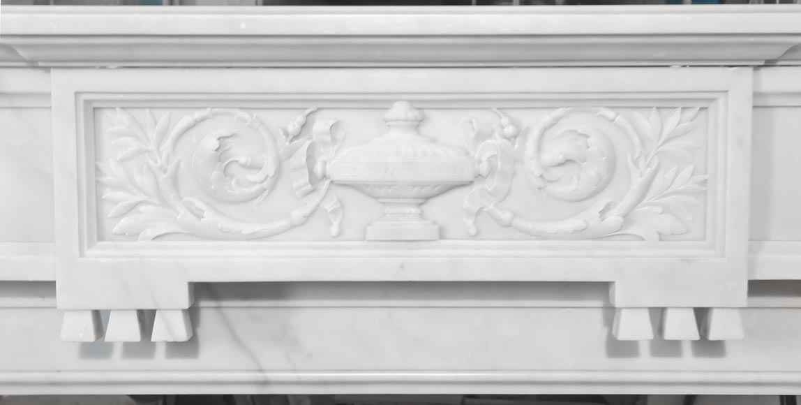 A Louis XVI style fireplace, richly decorated with garlands and vases, in Carrara marble A Louis XVI style fireplace, richly decorated with garlands and vases, in Carrara marble-1