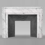 Louis XVI style curved fireplace in Arabescato marble, with rudenture and acanthus leaf