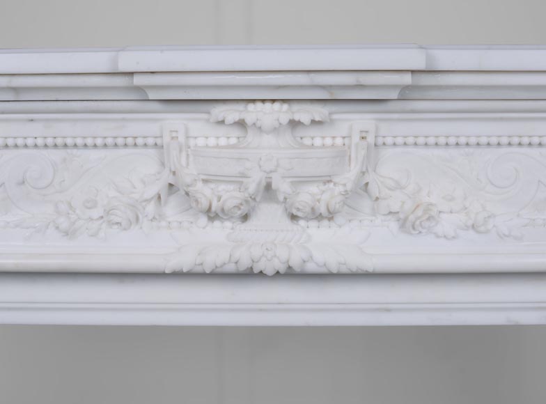 Large Louis XVI style mantel in semi-statuary marble with a vase decorated with garlands of flowers-1