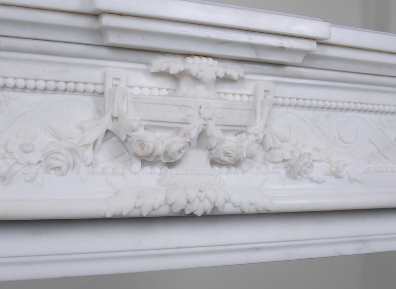 Large Louis XVI style mantel in semi-statuary marble with a vase decorated with garlands of flowers-2