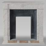 Small Louis XVI style Carrara marble mantel with flower