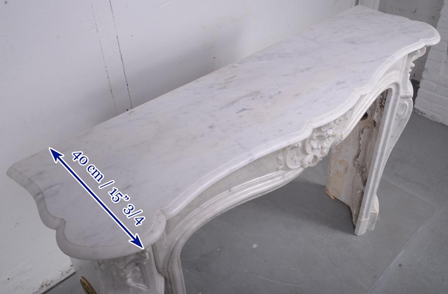 Louis XV style mantel adorned with acanthus leaves in Carrara marble-11