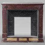 Louis XVI style mantel in Rouge Griotte marble with straight lines