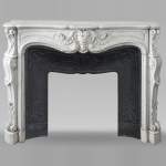 Large Louis XV style Carrara marble mantel with rich decoration