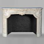 Exceptional Napoleon III period mantel in veined Carrara marble, adorned with a rich décor of palmettes and arabesques.