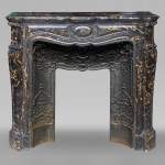Louis XV style mantel with Portor marble