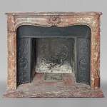 Louis XV period mantel in Nothern Red marble