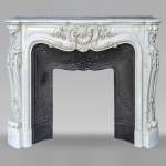 Louis XV style Carrara marble mantel with carved floral décor