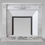 Louis XVI style mantel with laurel wreath carved in Carrara marble
