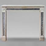 Louis XVI period stone and marble mantel