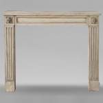 Louis XVI period mantel with fluted stone legs