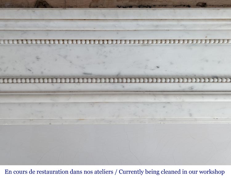 Louis XVI style Carrara marble mantel with rounded corners and beaded frieze-1