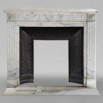 Louis XVI style mantel with sunflower carved in Arabescato marble