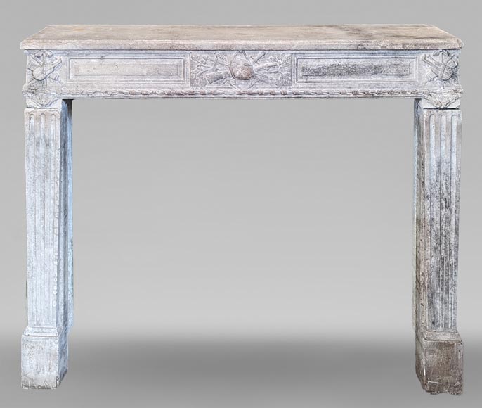 Louis XVI period stone mantel adorned with hunting figures and musical instruments-0