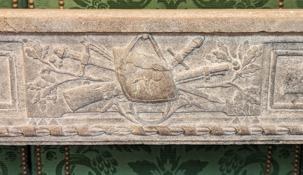Louis XVI period stone mantel adorned with hunting figures and musical instruments-1