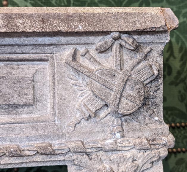 Louis XVI period stone mantel adorned with hunting figures and musical instruments-7