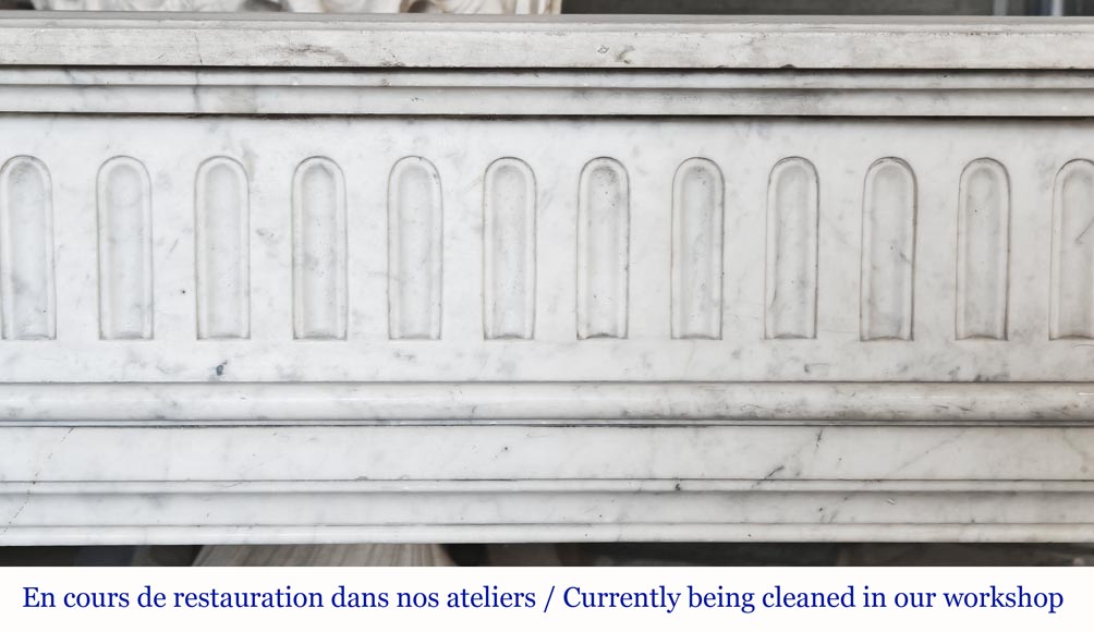  Louis XVI style fireplace in Carrara marble with rounded corners, decorated with rudenture-1