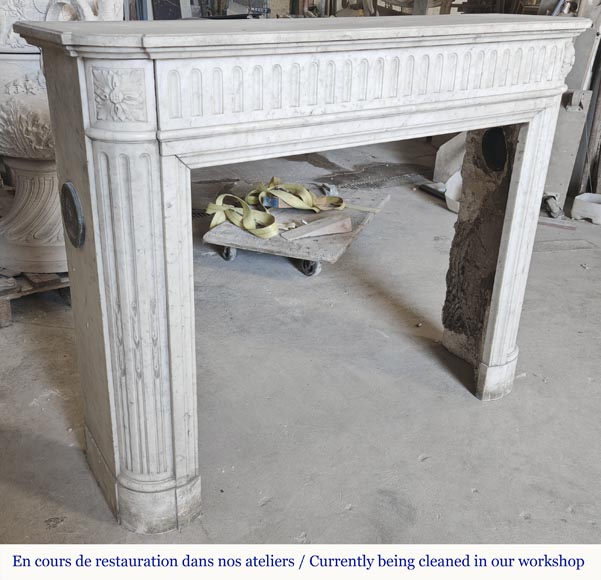  Louis XVI style fireplace in Carrara marble with rounded corners, decorated with rudenture-2