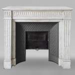 Louis XVI style mantel with Carrara marble jambs